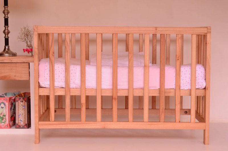 How high should crib mattress be for newborn
