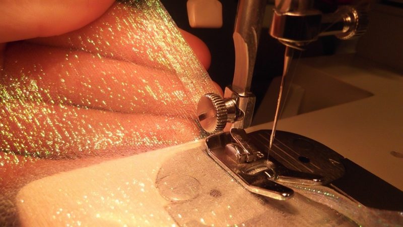 how to fix the reverse button on a sewing machine