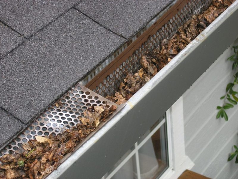 how to clean gutters with a pressure washer