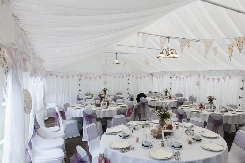 how to decorate a wedding tent on a budget