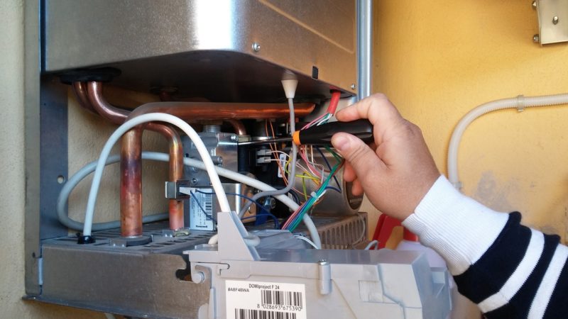 where is the reset button on a water heater