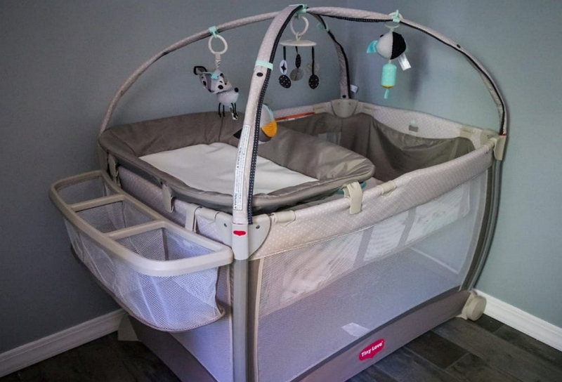How Do You Fold Up An Evenflo Playpen With Fabric Wall